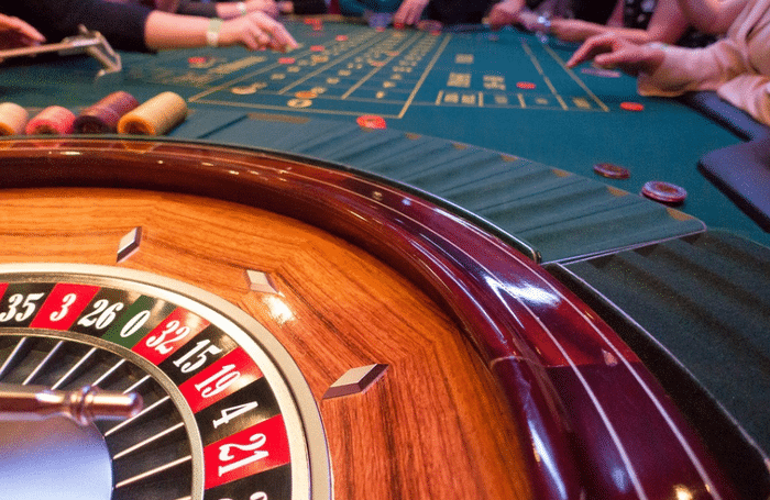 Roulette wheel and green table