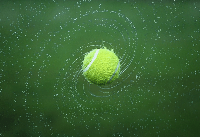 Spinning tennis ball